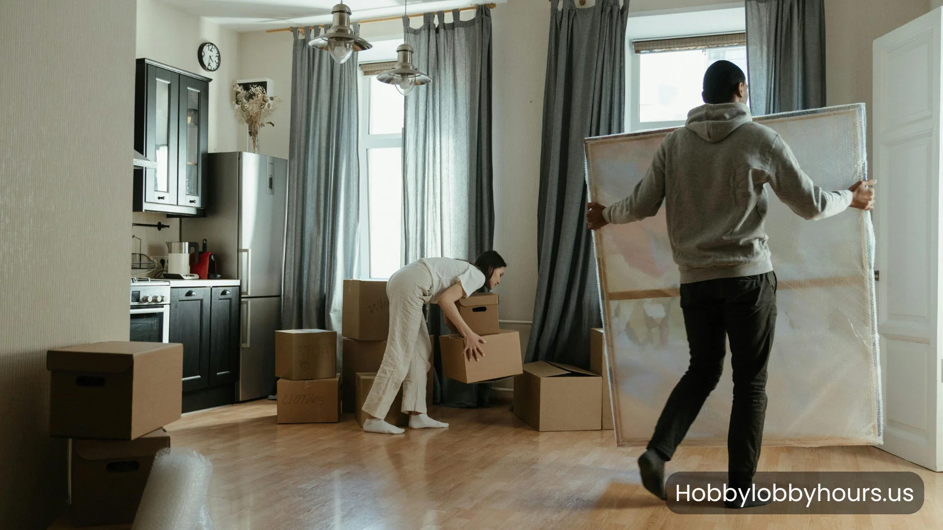 Couple moving into their new home.